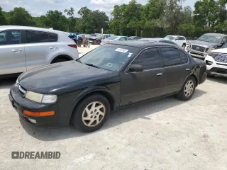 1999 Nissan Maxima GXE z VIN JN1CA21A2XT100464, wystawiony jako Copart lot #54252985 z przebiegiem 137 469 mil mil oraz Czysty tytuł • Clean title. Historia ofert i sprzedaży dostępna na DreamBid. Obrazek 1.