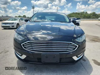 2017 Ford Fusion Hybrid SE with VIN 3FA6P0LU9HR356534, listed as a Copart auction lot 63660315 with 121,195 mi miles and Clean title. Bid and sale history available at DreamBid. Image 5.