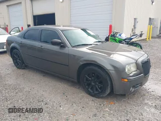 2008 Chrysler 300 Limited with VIN 2C3KA33G28H124038, listed as a IAAI auction lot 42538326 with 161,628 mi miles and . Bid and sale history available at DreamBid. Image 1.