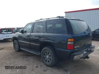 2006 Chevrolet Tahoe LS with VIN 1GNEC13V16J163907, listed as a IAAI auction lot 41232903 with 142,382 mi miles. Bid and sale history available at carsss.com. Image 3.