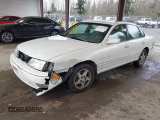 1998 Toyota Avalon XL with VIN 4T1BF18B5WU242038, listed as a IAAI auction lot 41577342 with 195,707 mi miles and . Bid and sale history available at DreamBid. Image 17.