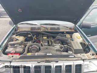 1996 Jeep Grand Cherokee Laredo with VIN 1J4GZ58S6TC333856, listed as a IAAI auction lot 42504895 with 176,955 mi miles and . Bid and sale history available at DreamBid. Image 10.