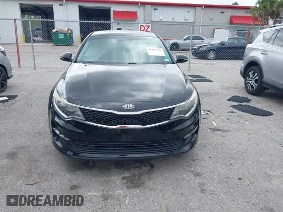2016 Kia Optima LX with VIN 5XXGT4L31GG024240, listed as a IAAI auction lot 41727309 with 70,031 mi miles. Bid and sale history available at carsss.com. Image 12.