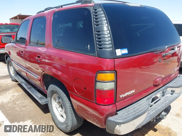 2004 GMC Yukon SLT with VIN 1GKEK13Z44R301456, listed as a IAAI auction lot 42056635 with 196,799 mi miles. Bid and sale history available at carsss.com. Image 3.