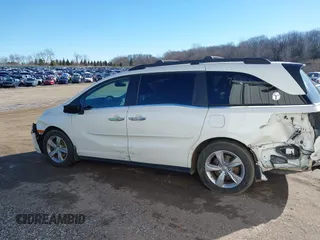 2018 Honda Odyssey EX-L with VIN 5FNRL6H75JB044422, listed as a IAAI auction lot 41730576 with 120,587 mi miles and . Bid and sale history available at DreamBid. Image 14.