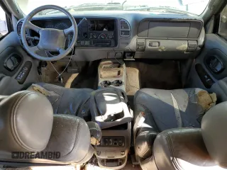 1999 GMC Denali z VIN 1GKEK13R0XR916686, wystawiony jako Copart lot #61120914 z przebiegiem 240 605 mil mil oraz Szkody całkowita. Historia ofert i sprzedaży dostępna na DreamBid. Obrazek 8.