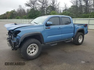 2018 Toyota Tacoma SR with VIN 5TFCZ5AN3JX158321, listed as a Copart auction lot 59869555 with 48,864 mi miles and Salvage title. Bid and sale history available at DreamBid. Image 1.