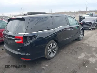 2023 Honda Odyssey Touring with VIN 5FNRL6H81PB068721, listed as a IAAI auction lot 41489618 with 20,202 mi miles and . Bid and sale history available at DreamBid. Image 4.