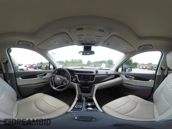 2021 Cadillac XT6 Premium Luxury with VIN 1GYKPDRS9MZ118642, listed as a IAAI auction lot 42664965 with 65,566 mi miles and . Bid and sale history available at DreamBid. Image 18.