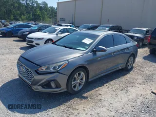 2018 Hyundai Sonata Sport with VIN 5NPE34AFXJH675527, listed as a IAAI auction lot 41996427 with 127,757 mi miles and . Bid and sale history available at carsss.com. Image 17.