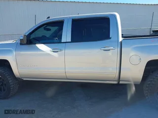 2015 Chevrolet Silverado 1500 LT with VIN 3GCUKREH1FG269823, listed as a IAAI auction lot 41398008 with 210,788 mi miles. Bid and sale history available at carsss.com. Image 14.