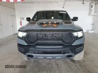2021 Ram 1500 with VIN 0K1905786880, listed as a Copart auction lot 61756114 with 34,927 mi miles and Clean title. Bid and sale history available at DreamBid. Image 5.