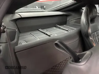 2016 Ferrari F12 z VIN ZFF74UFA2G0214140, wystawiony jako Copart lot #81488384 z przebiegiem 11 434 mil mil oraz Tytuł czysty. Historia ofert i sprzedaży dostępna na DreamBid. Obrazek 6.