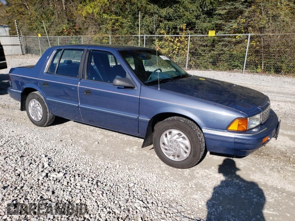 1994 Plymouth Acclaim z VIN 3P3AA46K8RT200674, wystawiony jako Copart lot #76425504 z przebiegiem 105 874 mil mil oraz Szkody całkowita. Historia ofert i sprzedaży dostępna na DreamBid. Obrazek 4.