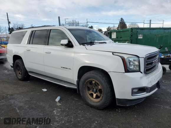 2015 GMC Yukon XL SLT with VIN 1GKS2HKC0FR220823, listed as a Copart auction lot 42155185 with 199,385 mi miles and Salvage Title. Bid and sale history available at carsss.com. Image 4.