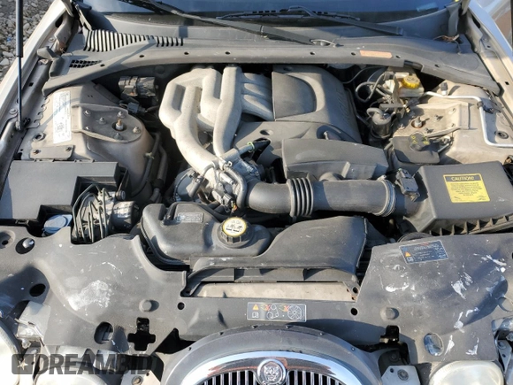 2005 Jaguar S-Type with VIN SAJWA01T55FN14254, listed as a Copart auction lot 86994974 with 126,484 mi miles and Salvage Title. Bid and sale history available at DreamBid. Image 11.
