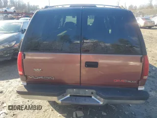 1997 GMC Yukon with VIN 1GKEK13R1VJ702558, listed as a Copart auction lot 85930054 with 165,837 mi miles and Salvage Title. Bid and sale history available at carsss.com. Image 6.