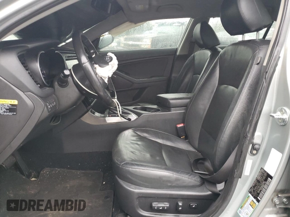 2014 Kia Optima EX with VIN KNAGN4AD4E5073906, listed as a Copart auction lot 72960004 with 123,453 mi miles and Salvage Title. Bid and sale history available at DreamBid. Image 7.
