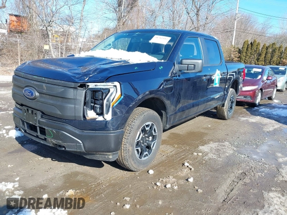 2023 Ford F-150 Lightning Pro with VIN 1FTVW1EL7PWG07081, listed as a IAAI auction lot 38702102 with 9,976 mi miles and . Bid and sale history available at DreamBid. Image 2.
