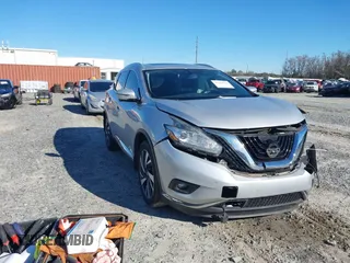 2017 Nissan Murano Platinum z VIN 5N1AZ2MG8HN113914, wystawiony jako IAAI lot #41212511 z przebiegiem 127 925 mil mil oraz . Historia ofert i sprzedaży dostępna na DreamBid. Obrazek 1.