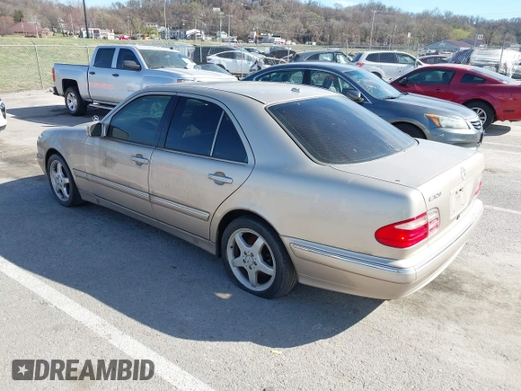 2001 Mercedes-Benz E-Class with VIN WDBJF65J61B251908, listed as a IAAI auction lot 41800893 with 187,178 mi miles. Bid and sale history available at carsss.com. Image 3.