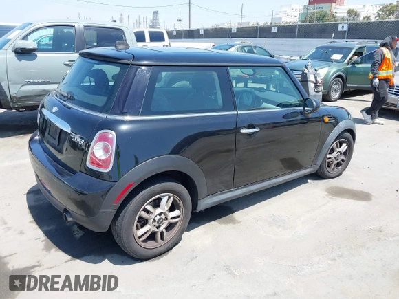 2013 MINI Cooper Hardtop with VIN WMWSU3C51DT691451, listed as a IAAI auction lot 42087943 with 132,570 mi miles. Bid and sale history available at carsss.com. Image 4.