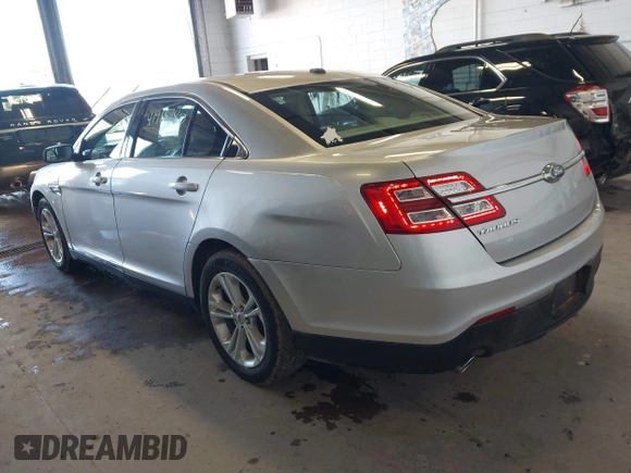 2015 Ford Taurus SE with VIN 1FAHP2D82FG183546, listed as a IAAI auction lot 41915780 with 72,773 mi miles and . Bid and sale history available at carsss.com. Image 3.