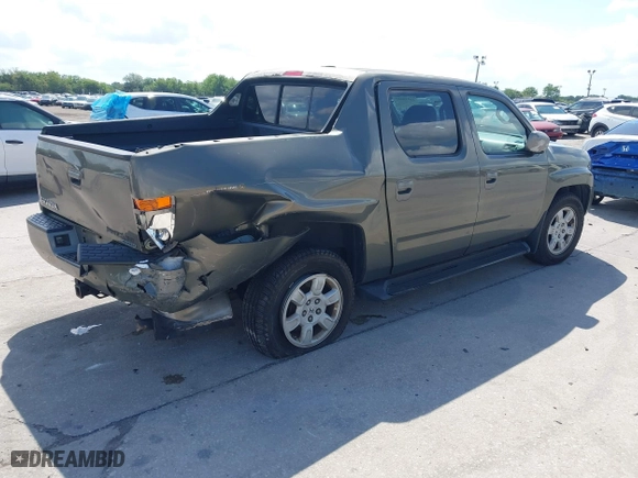2007 Honda Ridgeline RTL w/Leather with VIN 2HJYK16527H547522, listed as a IAAI auction lot 41939603 with 127,899 mi miles. Bid and sale history available at carsss.com. Image 4.