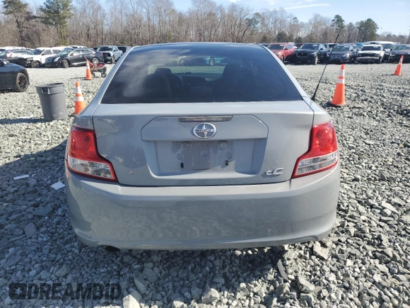 2012 Scion tC z VIN JTKJF5C78C3040542, wystawiony jako Copart lot #43595925 z przebiegiem 160 106 mil mil oraz Szkoda całkowita • Salvage title. Historia ofert i sprzedaży dostępna na DreamBid. Obrazek 6.