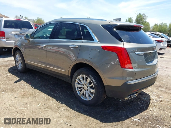 2018 Cadillac XT5 FWD with VIN 1GYKNARS5JZ242794, listed as a IAAI auction lot 42813475 with 32,266 mi miles and . Bid and sale history available at DreamBid. Image 3.