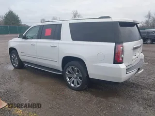 2016 GMC Yukon XL Denali with VIN 1GKS2HKJ9GR264481, listed as a IAAI auction lot 41764272 with 114,852 mi miles. Bid and sale history available at carsss.com. Image 3.