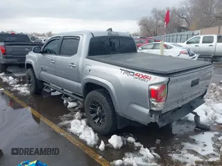 2021 Toyota Tacoma SR z VIN 3TMCZ5AN0MM386867, wystawiony jako IAAI lot #41580426 z przebiegiem 46 559 mil mil oraz . Historia ofert i sprzedaży dostępna na DreamBid. Obrazek 3.