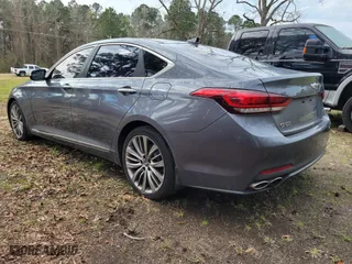 2015 Hyundai Genesis 5.0L with VIN KMHGN4JF8FU082535, listed as a IAAI auction lot 41768435 with 101,003 mi miles. Bid and sale history available at carsss.com. Image 3.