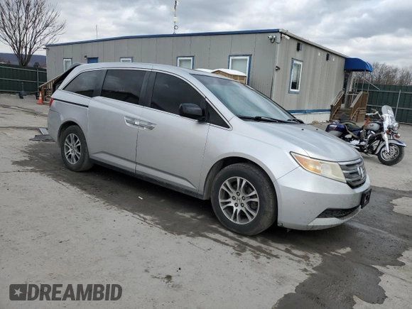 2011 Honda Odyssey EX-L with VIN 5FNRL5H63BB098661, listed as a Copart auction lot 52566345 with 177,071 mi miles and Salvage Title. Bid and sale history available at DreamBid. Image 4.