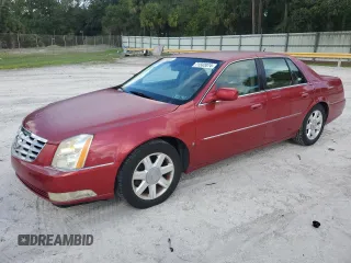 2006 Cadillac DTS 1SC z VIN 1G6KD57Y86U199826, wystawiony jako Copart lot #71582074 z przebiegiem 170 583 mil mil oraz Szkoda całkowita • Salvage title. Historia ofert i sprzedaży dostępna na DreamBid. Obrazek 1.
