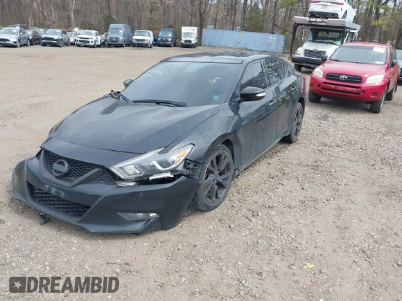2016 Nissan Maxima SL with VIN 1N4AA6APXGC420735, listed as a IAAI auction lot 41972436 with 148,140 mi miles and . Bid and sale history available at DreamBid. Image 18.