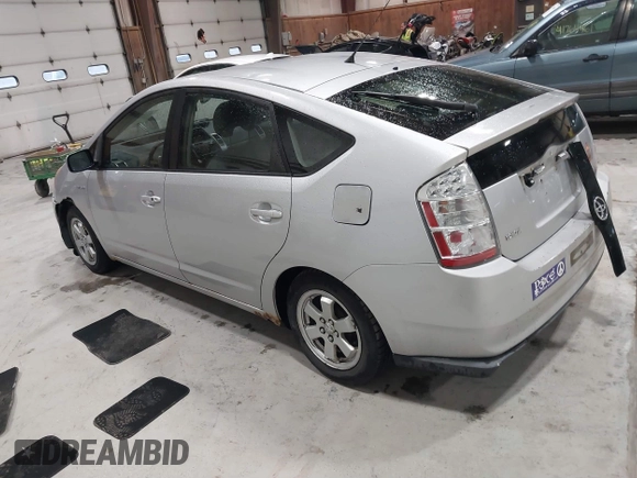 2007 Toyota Prius z VIN JTDKB20U977649489, wystawiony jako IAAI lot #41772600 z przebiegiem 248 525 mil mil oraz . Historia ofert i sprzedaży dostępna na DreamBid. Obrazek 3.