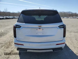 2025 Cadillac XT6 AWD Sport z VIN 1GYKPHRS5SZ101521, wystawiony jako Copart lot #48552185 z przebiegiem 262 mil mil oraz Szkody całkowita. Historia ofert i sprzedaży dostępna na DreamBid. Obrazek 6.