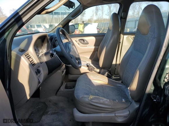 2001 Ford Escape XLS with VIN 1FMYU01161KA46822, listed as a Copart auction lot 48810055 with 253,402 mi miles and Salvage Title. Bid and sale history available at carsss.com. Image 7.