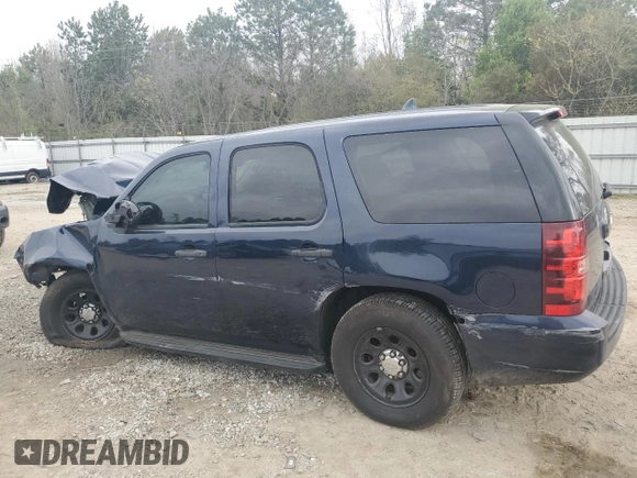 2014 Chevrolet Tahoe Commercial with VIN 1GNLC2E08ER209599, listed as a Copart auction lot 51018165 with 111,585 mi miles and Salvage title. Bid and sale history available at DreamBid. Image 2.