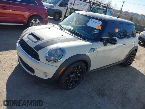 2009 MINI Hardtop S with VIN WMWMF73519TT99560, listed as a IAAI auction lot 41691939 with Not provided miles and . Bid and sale history available at DreamBid. Image 2.