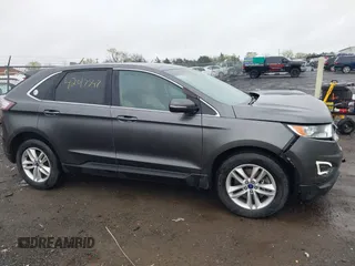 2016 Ford Edge SEL z VIN 2FMPK4J87GBC61845, wystawiony jako IAAI lot #42017547 z przebiegiem 90 710 mil mil oraz . Historia ofert i sprzedaży dostępna na DreamBid. Obrazek 13.