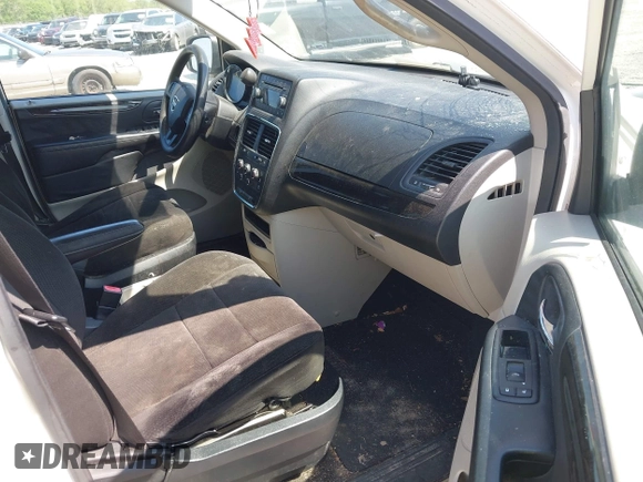 2013 Dodge Grand Caravan SE with VIN 2C4RDGBG9DR516044, listed as a IAAI auction lot 41998893 with 214,645 mi miles and . Bid and sale history available at DreamBid. Image 5.