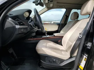 2012 BMW X5 35i z VIN 5UXZV4C51CL989449, wystawiony jako Copart lot #56762095 z przebiegiem 112 576 mil mil oraz Szkoda całkowita • Salvage title. Historia ofert i sprzedaży dostępna na DreamBid. Obrazek 7.