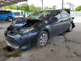 2019 Toyota Corolla L z VIN 5YFBURHE6KP862407, wystawiony jako Copart lot #56648795 z przebiegiem 90 890 mil mil oraz Szkoda całkowita • Salvage title. Historia ofert i sprzedaży dostępna na DreamBid. Obrazek 1.