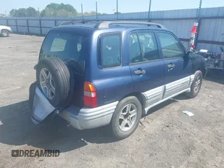 2002 Chevrolet Tracker LT z VIN 2CNBE634426952677, wystawiony jako IAAI lot #42009744 z przebiegiem 243 692 mil mil oraz . Historia ofert i sprzedaży dostępna na DreamBid. Obrazek 4.