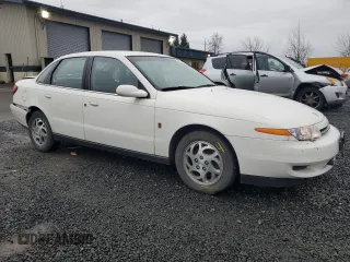 2002 Saturn LS z VIN 1G8JU54F02Y565111, wystawiony jako Copart lot #45324615 z przebiegiem 77 392 mil mil oraz Szkoda całkowita • Salvage title. Historia ofert i sprzedaży dostępna na DreamBid. Obrazek 4.