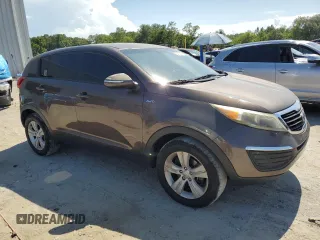 2012 Kia Sportage LX with VIN KNDPBCA20C7214959, listed as a Copart auction lot 62730645 with 194,768 mi miles and Clean title. Bid and sale history available at DreamBid. Image 4.