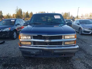 1997 Chevrolet Tahoe with VIN 1GNEK13R4VJ418974, listed as a IAAI auction lot 41560411 with 198,170 mi miles. Bid and sale history available at carsss.com. Image 12.