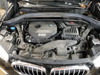 2017 BMW X1 xDrive28i with VIN WBXHT3C34H5F87048, listed as a Copart auction lot 67545012 with 76,666 mi miles. Bid and sale history available at carsss.com. Image 12.